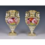 A pair of 19th century English porcelain vases, probably Spode, of classical urn form, with twin