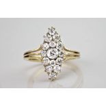 A fine antique 18ct yellow gold and diamond navette ring, featuring approximately 0.85ct of old