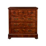 A mid-19th century Continental straight front mahogany chest, the flame veneered moulded top over