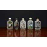 A collection of four Chinese inside painted snuff bottles, 20th century, of rectangular form, all