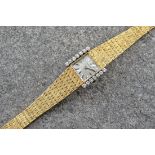 A 1950s-60s Jaeger LeCoultre 18ct gold and diamond backwind ladies wrist watch, no. 824906, the