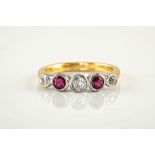 An 18ct gold, ruby and diamond 5 stone ring, featuring 3 brilliant cut diamonds and 2 round cut