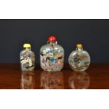 Three Chinese interior painted glass snuff bottles, 20th century, of varying forms, all with