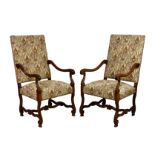 A pair of 17th century style carved walnut open armchairs, Victorian, the rectangular backs and
