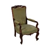 An early Victorian carved rosewood open armchair, the showframe padded back with serpentine, foliate