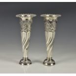 A pair of Victorian silver bud vases, Samuel Walton Smith, London 1899, of trumpet form with