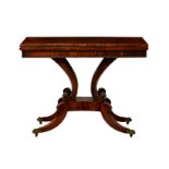 A late Regency rectangular rosewood card table, the well figured, cross banded foldover top over a