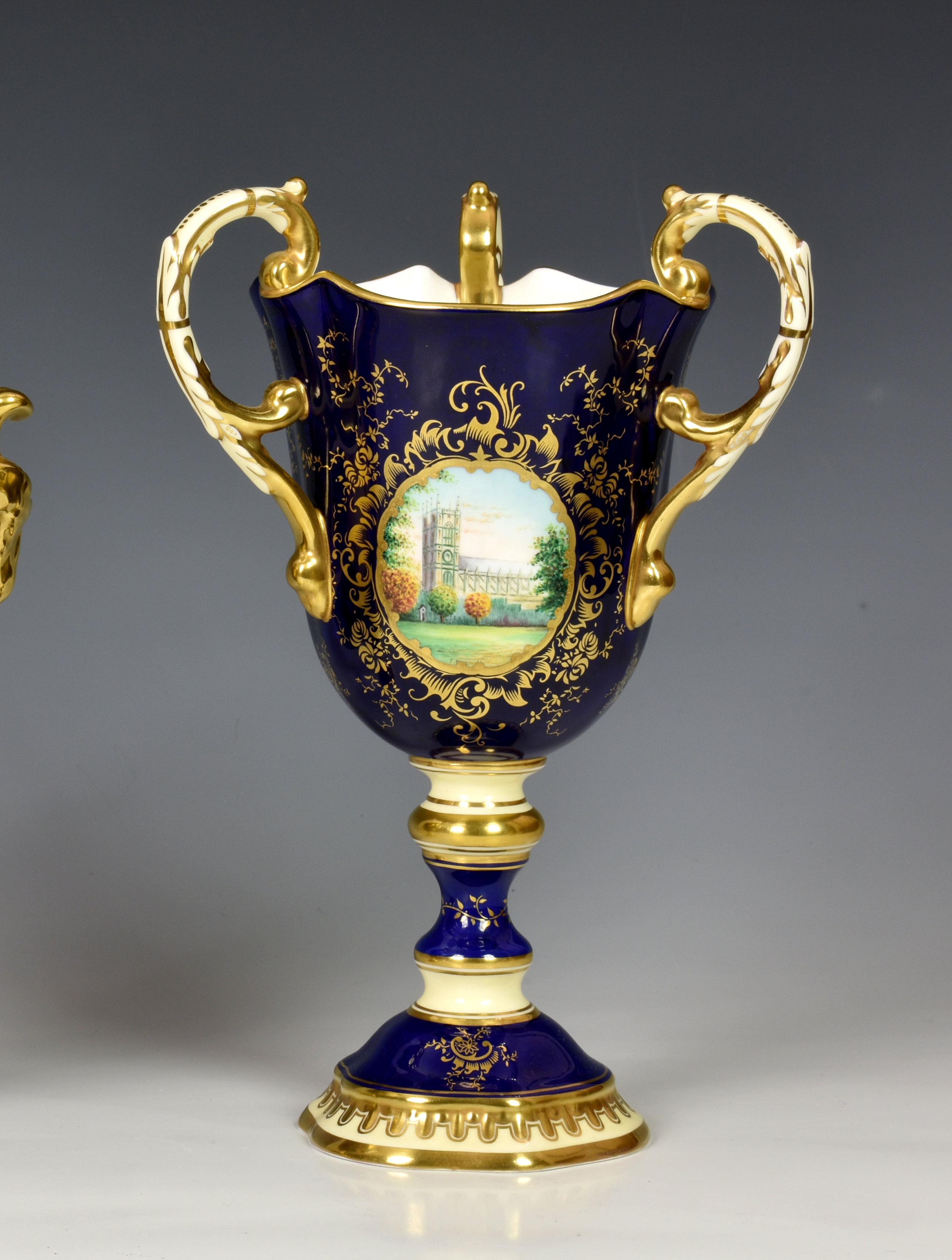 A limited edition Coalport Fine Bone China Royal commemorative triple-handled campana vase, or