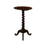 A Victorian rosewood and walnut tripod table, alterations, the fixed, scalloped rosewood top on a