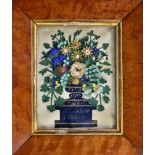 A set of three Victorian cut paper still life diorama, each depicting a floral and foliate spray