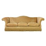 A good quality camel back three seater sofa, modern, with scrolled arms and three seat cushions,
