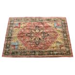 A Persian style wool rug, by Nourison Rugs, 'Living Treasures', the central eight point medallion on