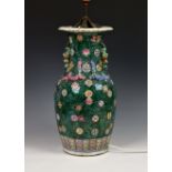 An unusual 19th century Chinese famille rose baluster vase, with later lamp conversion, drilled,