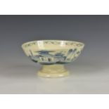 An early 19th century pearlware blue and white pedestal bowl, of circular form, with decorative