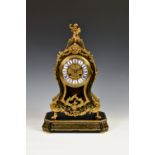 A French Boulle inlaid striking mantel clock, late 19th century, the balloon shaped case with gilt