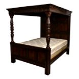 A Charles II style oak full tester four poster bed, first half 20th century, the full, panelled