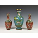 A pair of Chinese cloisonné vases, early 20th century, tapered baluster form with long tapering