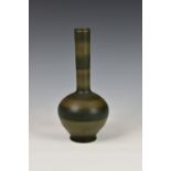 A Chinese teadust glazed bottle vase, probably first half 20th century, the slightly ovoid body with