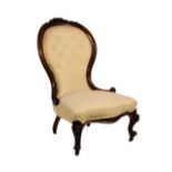 A Victorian carved walnut spoon back ladies chair, the showframe carved with a floral surmount and