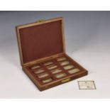 A limited edition Birmingham Mint set of 12 commemorative silver ingots depicting 'Royal Palaces',