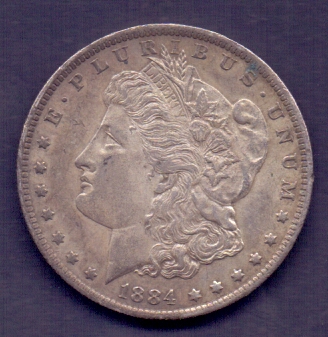 COINS : 1884 US $1 in reasonable condition, always a sought after classic Silver Coin 26.