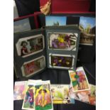 POSTCARDS : Three postcard albums of mainly modern and greetings cards,