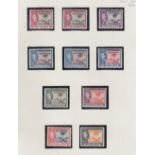STAMPS GAMBIA : 1938-46 George VI set of 16 plus extra shades, lightly M/M on two album pages,