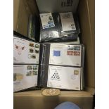 Large box of First Day covers in various albums 1950's onwards some better cancels noted,
