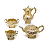 ˜A SILVER-GILT FOUR-PIECE TEA SET, C.J. HILL (LATE CATCHPOLE & WILLIAMS) AND C.S.HARRIS & SONS LTD.