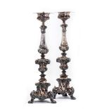 A PAIR OF SILVERED METAL ALTAR CANDLESTICKS, PROBABLY ITALIAN, MID 18TH CENTURY