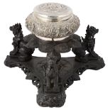 A BURMESE SILVER BOWL AND COVER ON WOOD STAND, RANGOON, 1920s