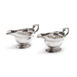 A PAIR OF GEORGE II SILVER SAUCEBOATS, JOHN CHARTIER, LONDON, 1734