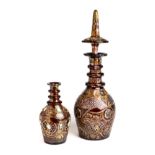 TWO BOHEMIAN RED OVERLAY GLASS DECANTERS, CIRCA 1900