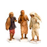 THREE INDIAN CLAY FIGURES OF TRADESMEN, PROBABLY KRISHNANAGAR, BENGAL, 19TH CENTURY