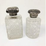 ˜TWO VICTORIAN SILVER-MOUNTED CUT-GLASS TOILET BOTTLES