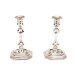 A PAIR OF GEORGE V SILVER CANDLESTICKS, THOMAS BRADBURY & SONS LTD., SHEFFIELD, 1928