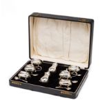 A CASED GEORGE V SILVER EIGHT-PIECE CONDIMENT SET, ADIE BROTHERS LTD., BIRMINGHAM, 1828