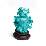 A CHINESE CARVED TURQUOISE 'PEONY' VASE AND COVER, EARLY 20TH CENTURY