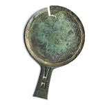 A BRONZE MIRROR, BURMA OR CHINA