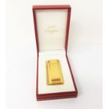 A CARTIER GOLD PLATED LIGHTER, LATE 20TH CENTURY