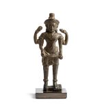 A KHMER BRONZE FIGURE OF VISHNU, ANGKOR WAT, CAMBODIA, 12TH CENTURY