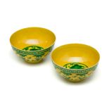 A PAIR OF CHINESE YELLOW AND GREEN 'DRAGON' BOWLS, 20TH CENTURY