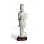 A CHINESE CARVED JADEITE FIGURE OF A MAIDEN, EARLY 20TH CENTURY