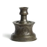 A BRONZE CANDLESTICK, ANATOLIA, PROBABLY KONYA, 14TH/15TH CENTURY