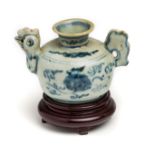 A CHINESE BLUE AND WHITE 'COCKEREL' EWER, 17TH CENTURY
