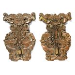 A PAIR OF CARVED WOOD SCONCES, JAVA, CIRCA 18TH CENTURY