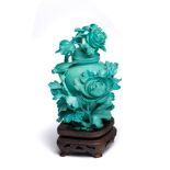 A CHINESE CARVED TURQUOISE 'PEONY' VASE AND COVER, EARLY 20TH CENTURY