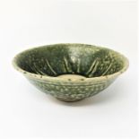 AN ANAMESE GREEN-GLAZED POTTERY BOWL, EARLY 17TH CENTURY