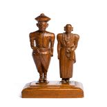 A CARVED WOOD MODEL OF A KANDYAN ROYAL COUPLE, SRI LANKA, FIRST HALF 20TH CENTURY