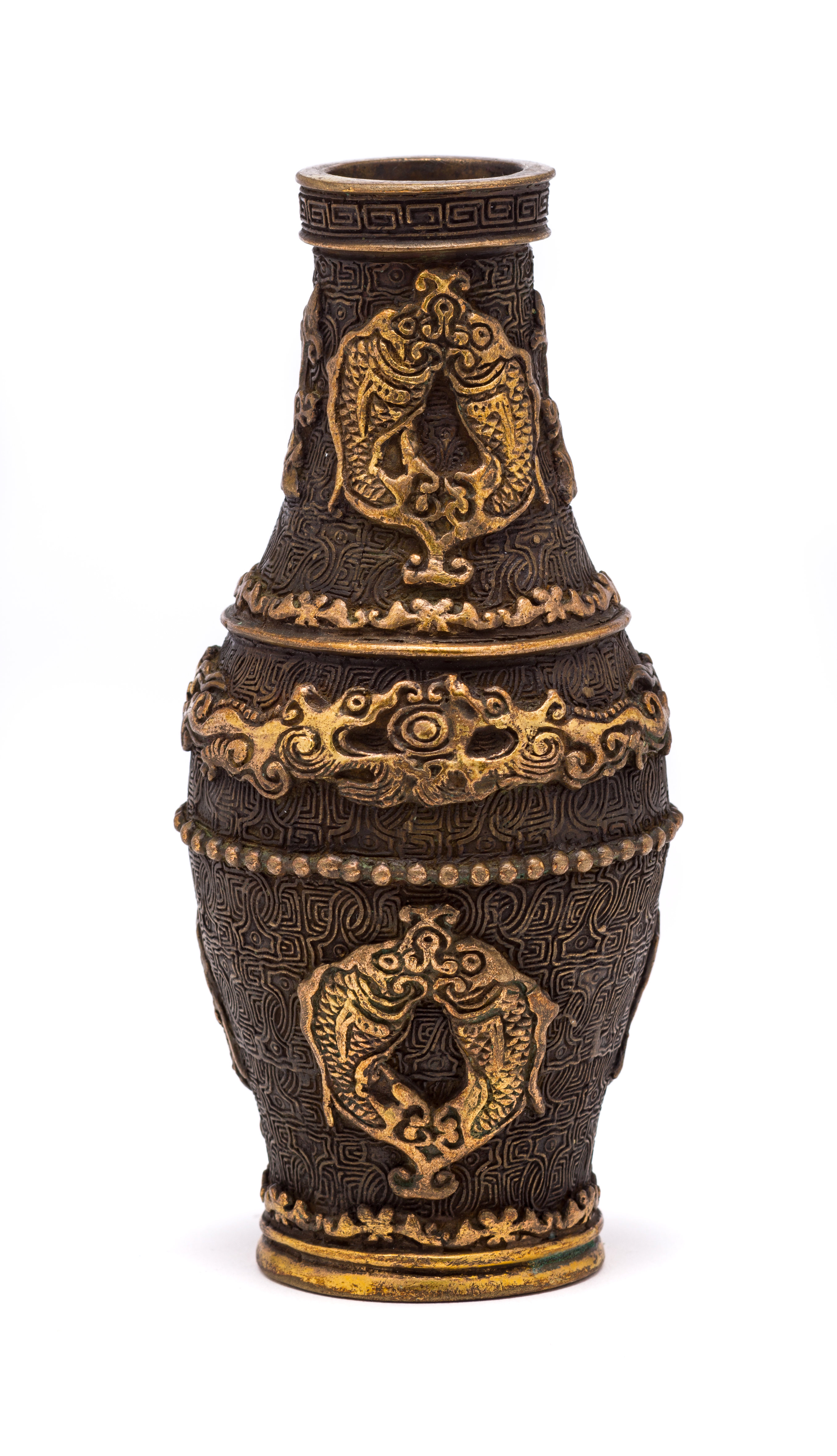 A SMALL CHINESE PARCEL-GILT BRONZE BOTTLE VASE